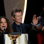 Director Houda Benyamina, Camera d'Or award winner for her film "Divines", reacts on stage during the closing ceremony of the 69th Cannes Film Festival in Cannes, France, May 22, 2016. REUTERS/Eric Gaillard